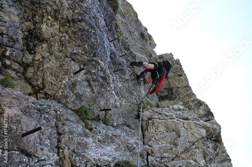 Climber in wall of Heli - Kraft - Klettersteig, Hochkar, Austria 