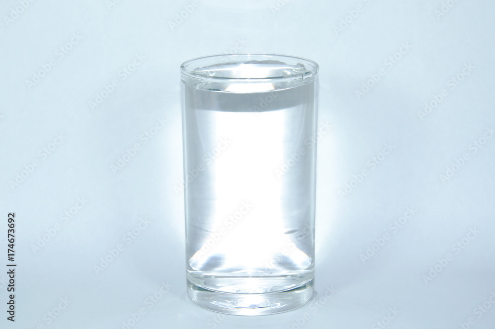fresh water in drinking glass on white background fresh water in drinking glass on white background
