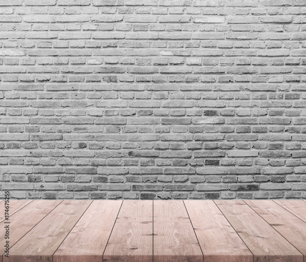 Wood table top and background of old brick wall - can used for display or montage your products.
