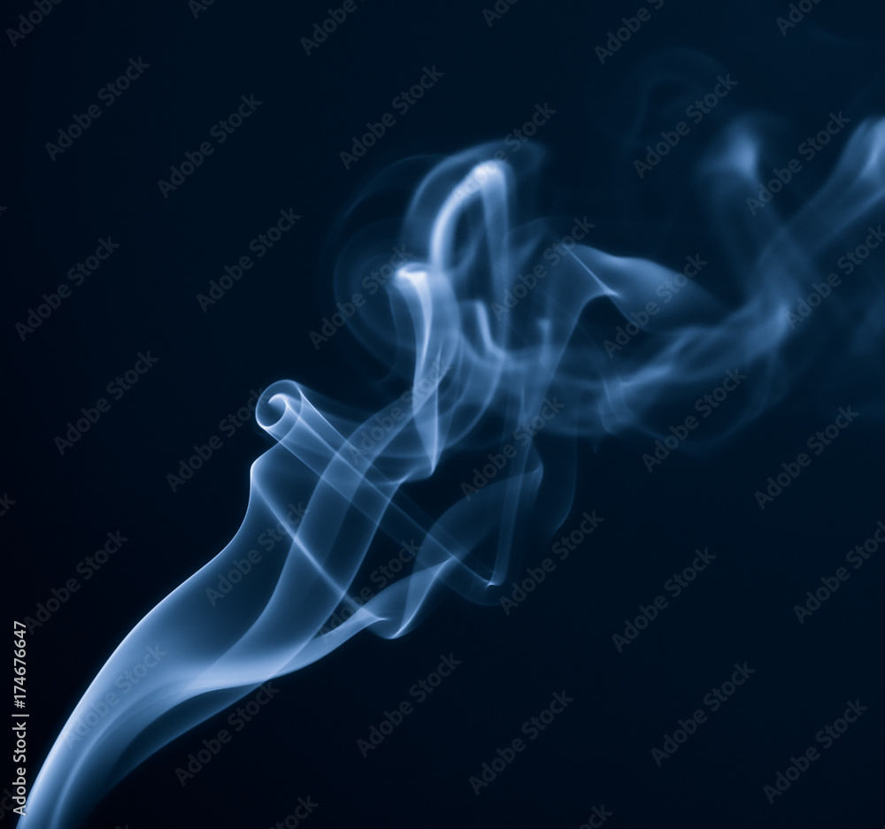 Smoke closeup on a black background. Macro photo.