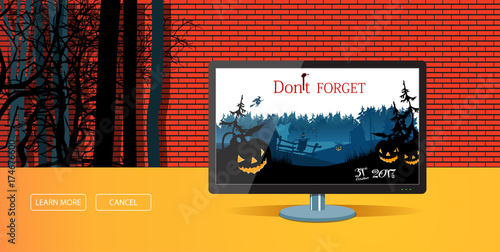 Office computer display with halloween background