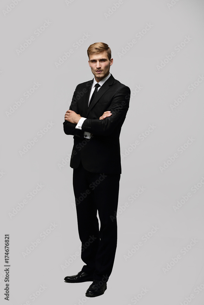 portrait in full growth serious businessman. portrait in full growth serious businessman.