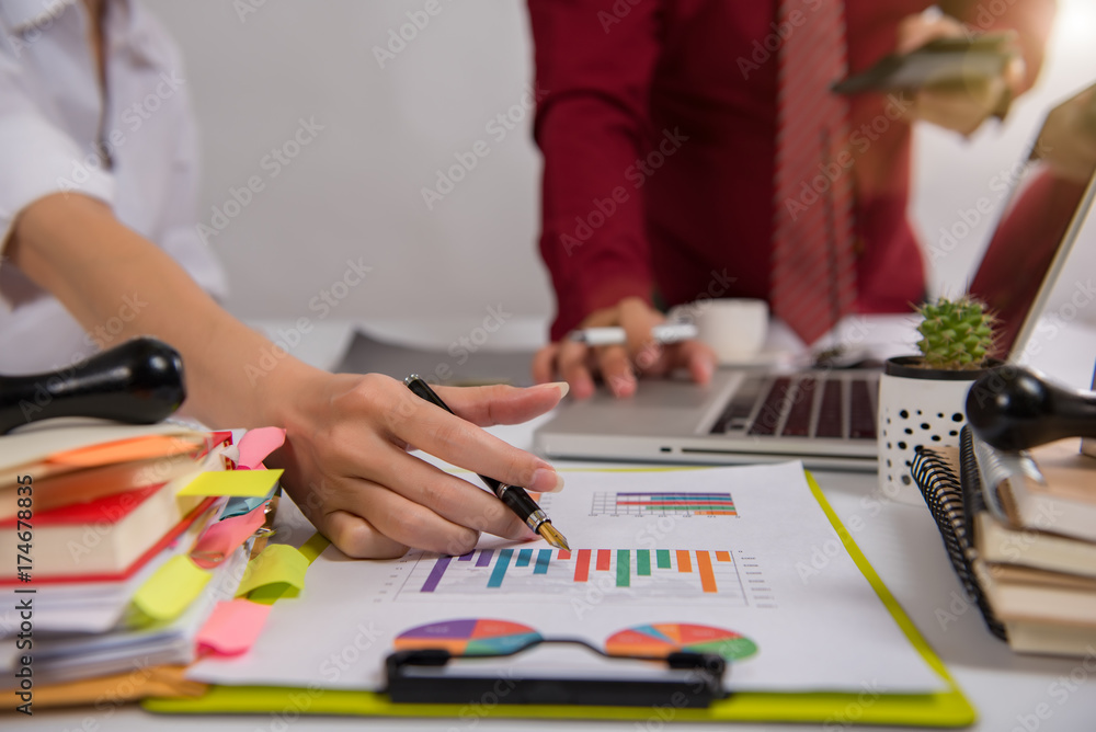 Fototapeta premium businesswoman hand working with finances about cost and calculator