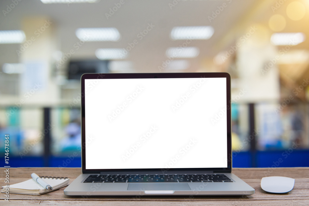 Computer Laptop and tablet computer on the table blur background with bokeh, business technology concept Computer Laptop and tablet computer on the table blur background with bokeh, business technology concept