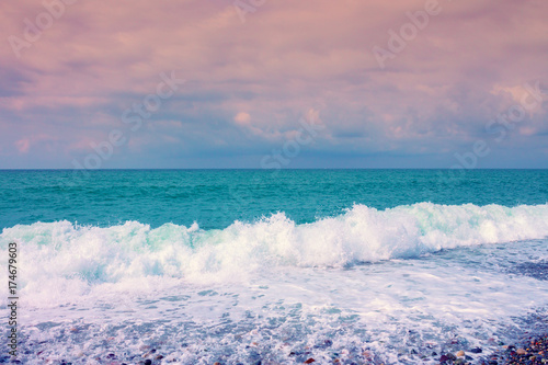 Sea wave foam on the beach, sea surf, waves, seashore.
