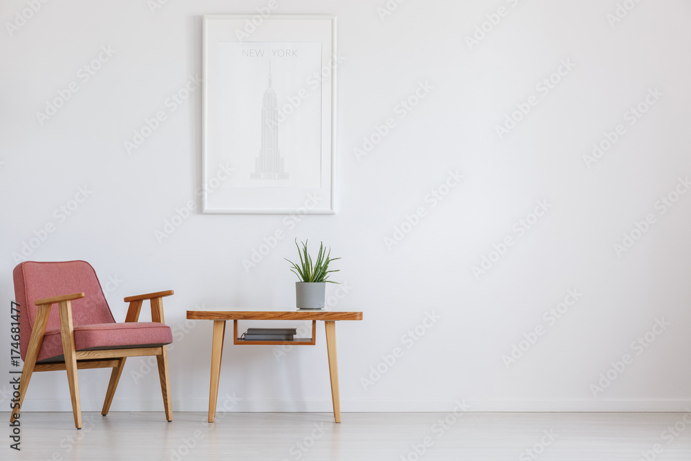 Pink chair next to table Pink chair next to table