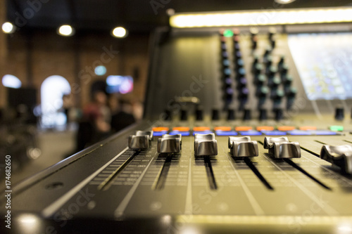 Close up of faders on a sound desk