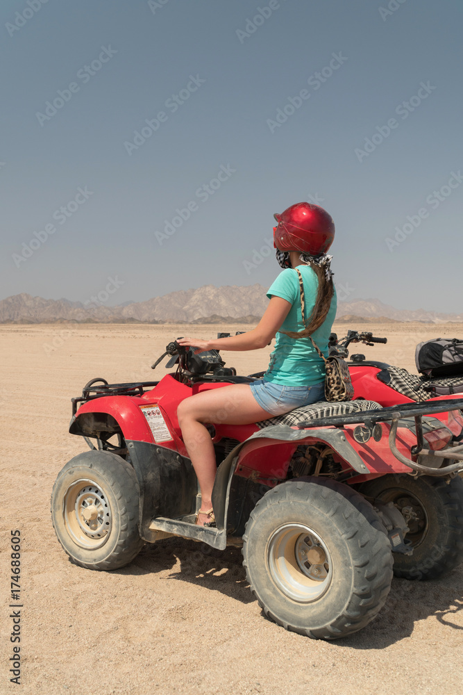 Adventurous woman on road trip through the Desert in Egypt Adventurous woman on road trip through the Desert in Egypt