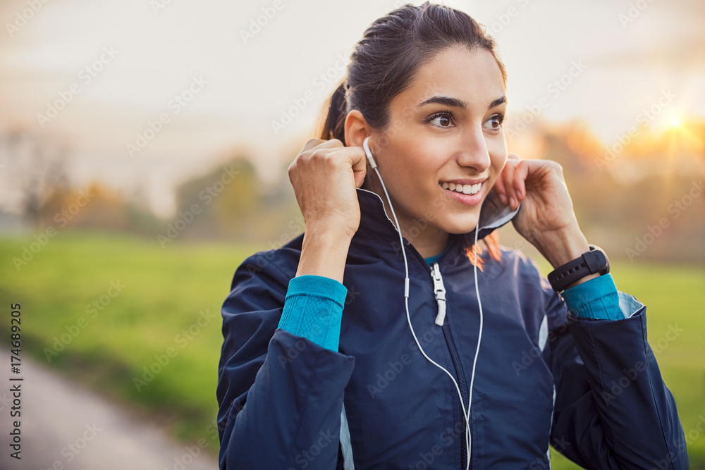 © Rido - Athletic woman listening music © Rido - Athletic woman listening music