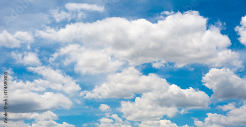 Many white clouds on blue sky