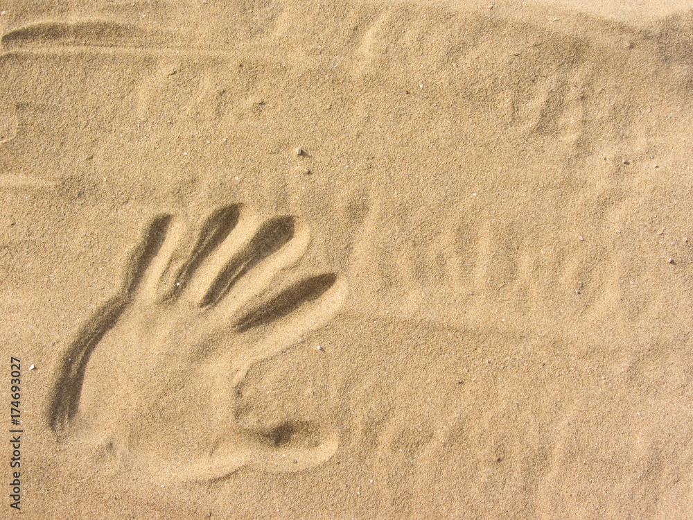 playing with sand on the beach ( single hand shape ) playing with sand on the beach ( single hand shape )