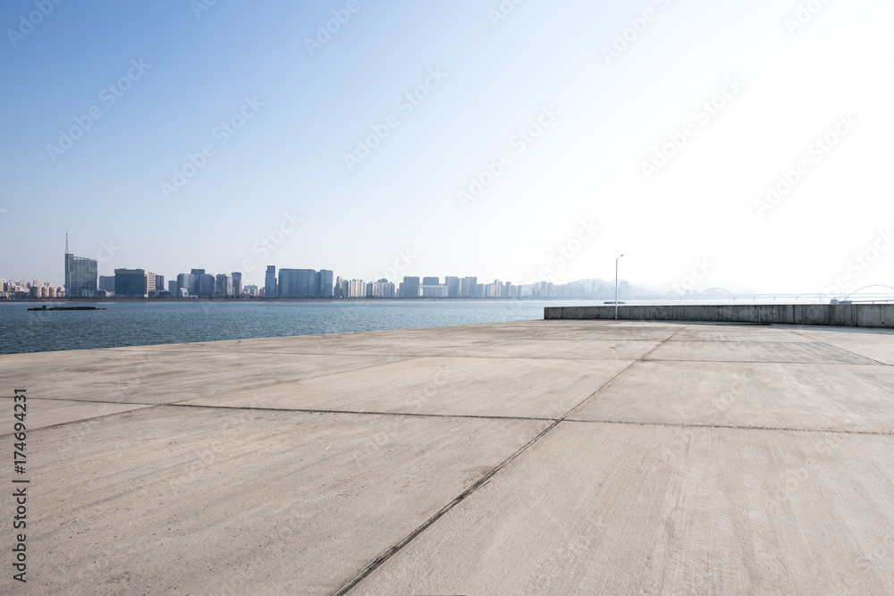 empty marble floor with cityscape of modern city empty marble floor with cityscape of modern city