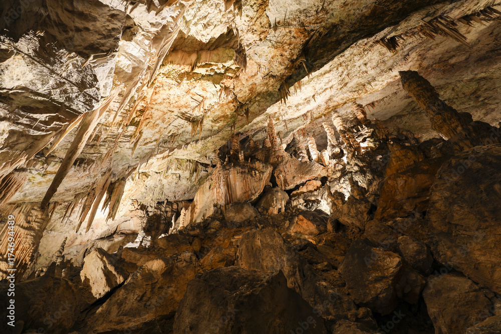 Picturesque karst features illuminated in the cave Picturesque karst features illuminated in the cave