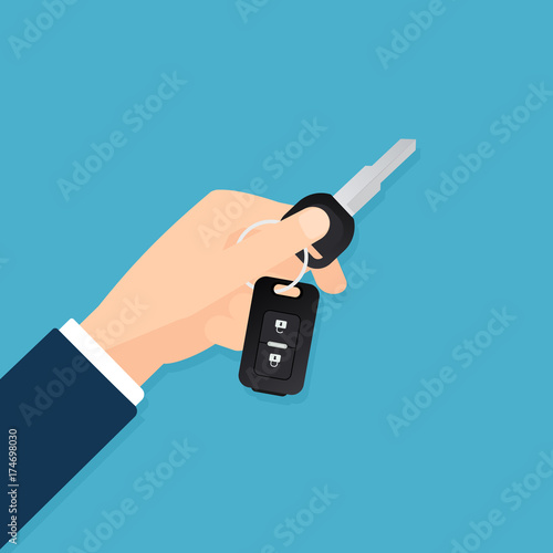 hand holding key car