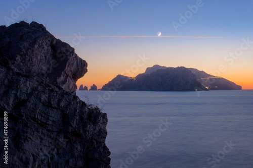Capri Island snatched by the Cliff's Mouth, Amalfi Coast, Bay Of Naples, Naples, Campania, Italy.