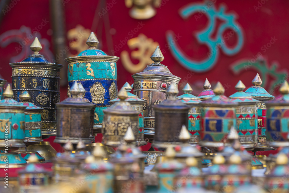 Tibetan praying objects for sale at a souvenir shop in Ladakh, India.