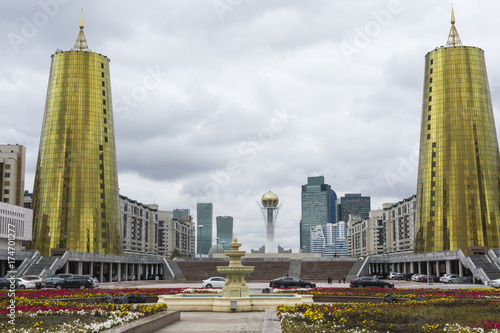 The construction of glass and concrete on the main square, called the golden towerand a view of the complex of administrative buildings. Kazakhstan.