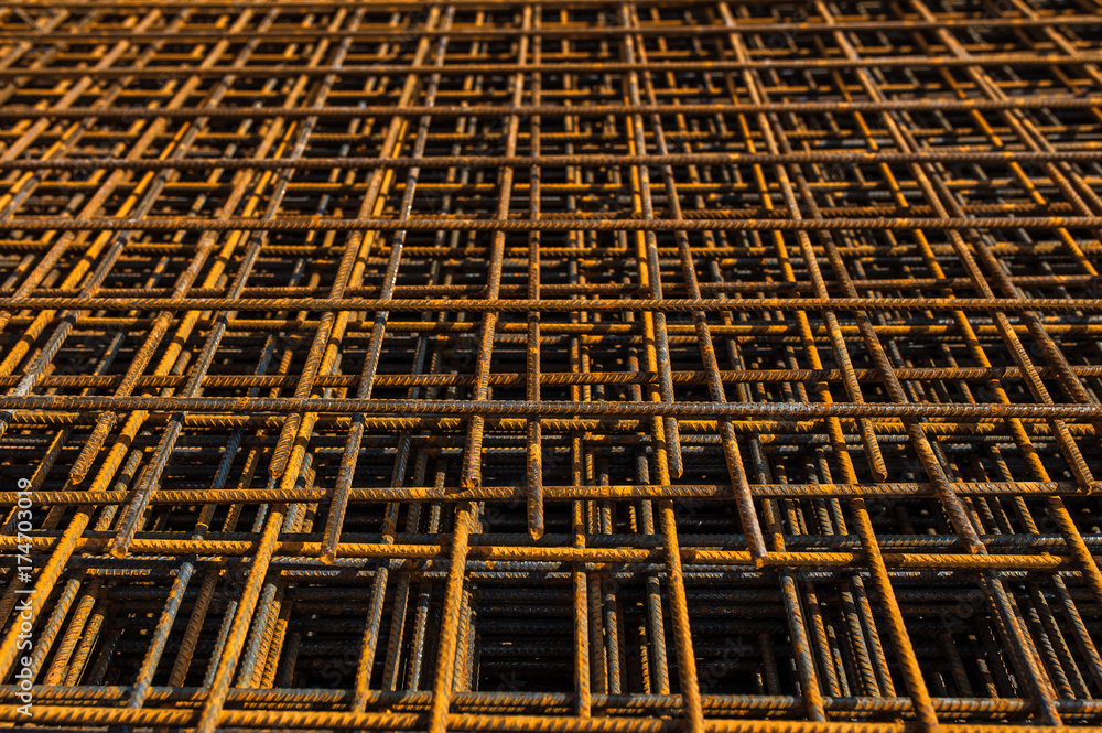 Stacked reinforced steel foundation bars on construction site 