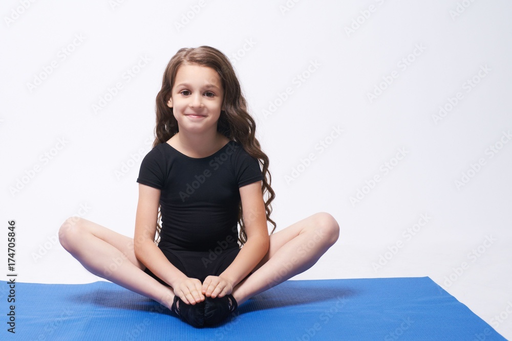 Yoga. Relax. Equilibrium. Lotus position. Curly girl. Brunette Yoga. Relax. Equilibrium. Lotus position. Curly girl. Brunette