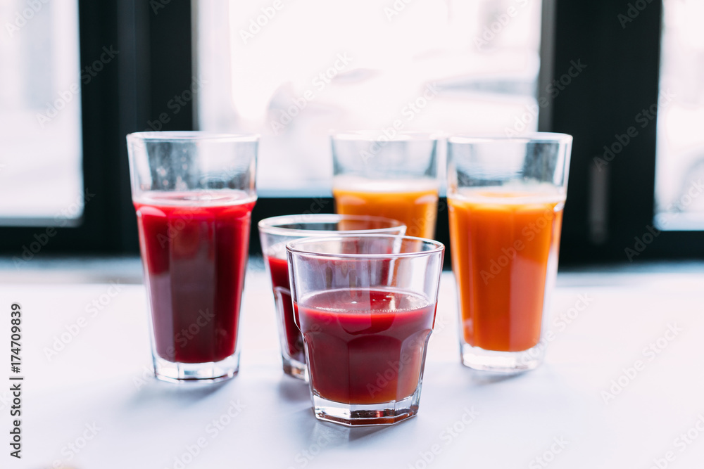 various smoothies in glasses various smoothies in glasses