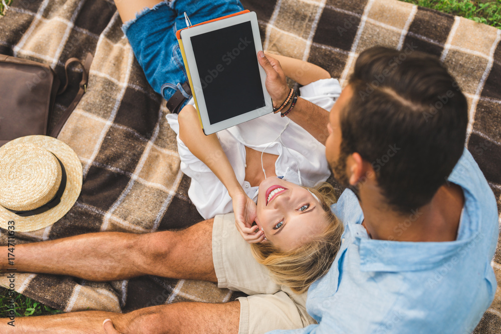 Fototapeta premium young couple with tablet