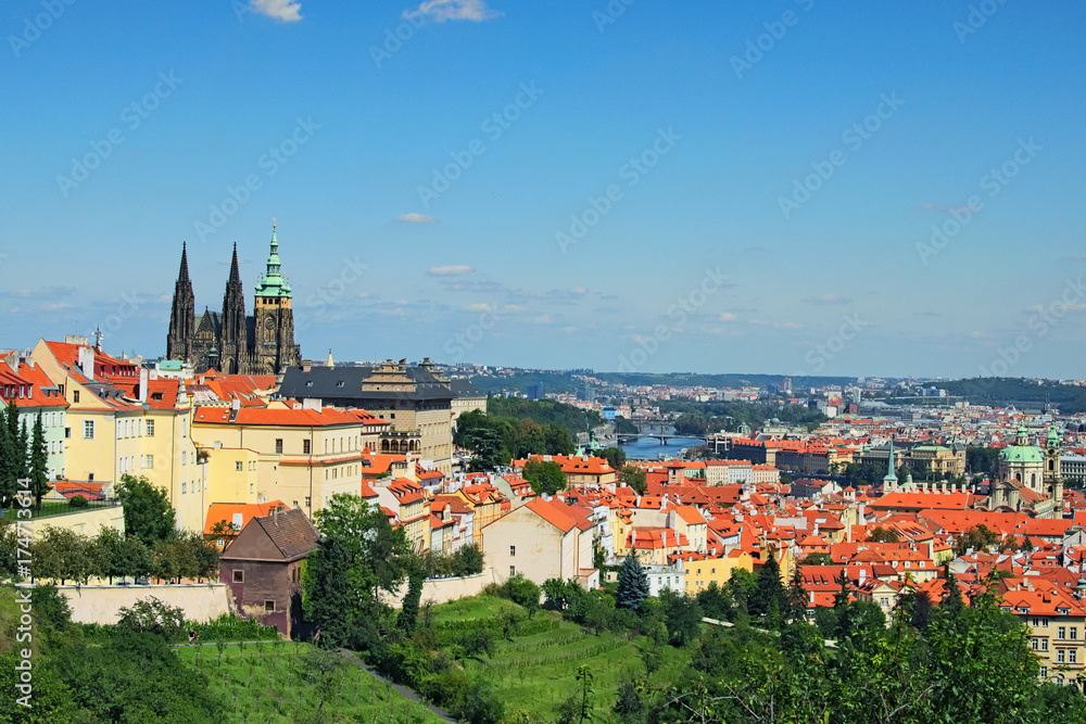 A picturesque view to the St. Vitus Cathedral, Hradcany and the Vltava River. Summer sunny day. Prague, The Czech Republic
