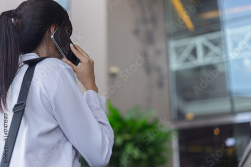 modern business woman working with smartphone outdoor