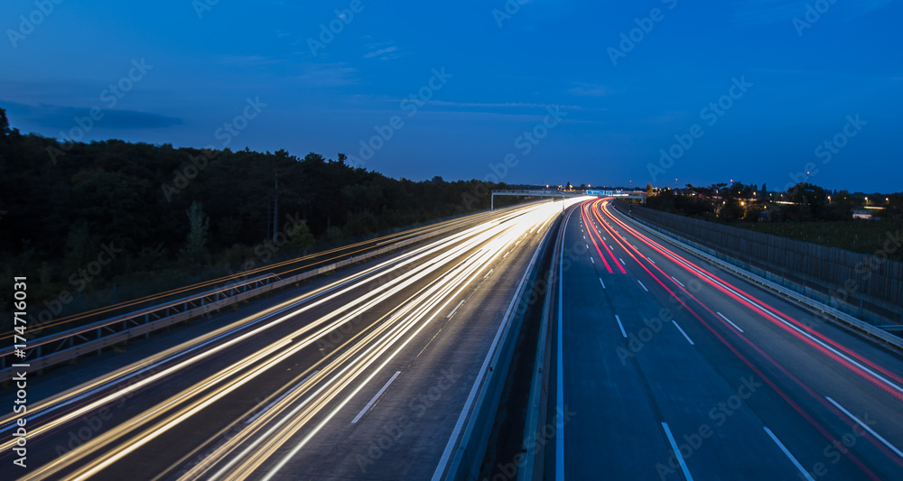 light trace from busy night traffic on the highway light trace from busy night traffic on the highway