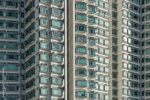 Highrise residential building in Hong Kong city. The many windows in the building Hongkong.