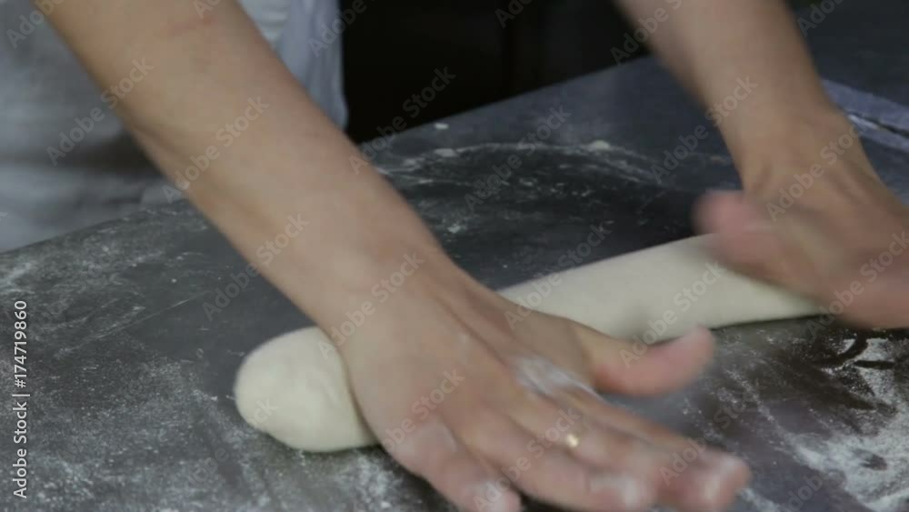 chef prepares bread to bake 