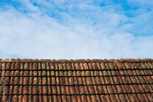 Alt german roof covered with Bitumin tiles. © Oleksandr