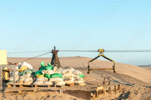 Cableway infrastructure at Guano island near Longbeach in Namib Desert