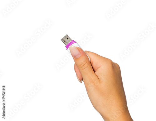 hand of a girl with a flash drive