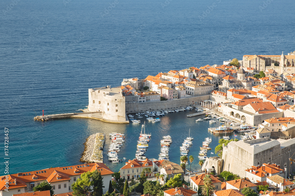 Panoramic view from above on the old fortifications and the port of Dubrovnik. Croatia