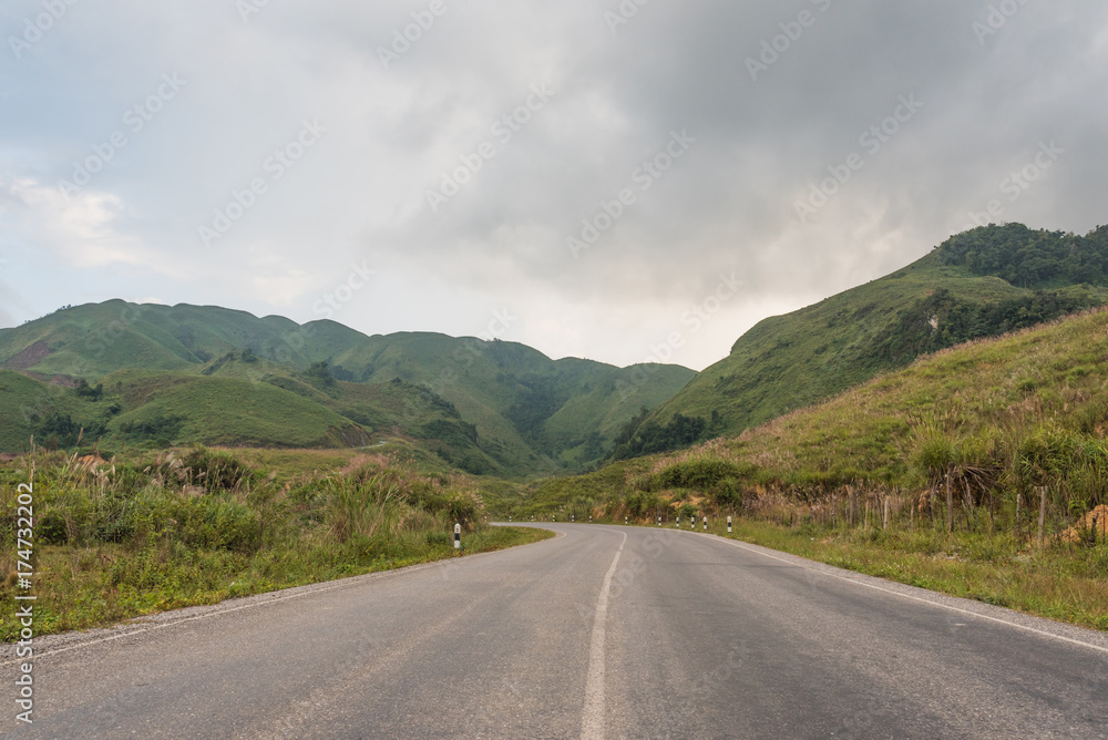 mountain road in countryside of Lao in evening, before rainy