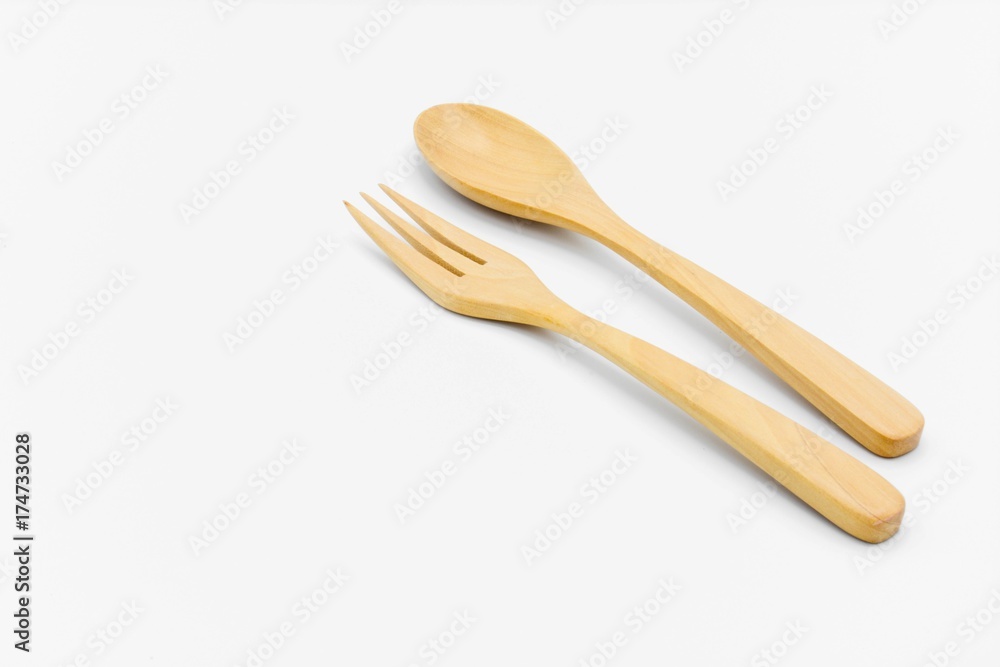 Wooden spoon and fork isolated on white background Wooden spoon and fork isolated on white background