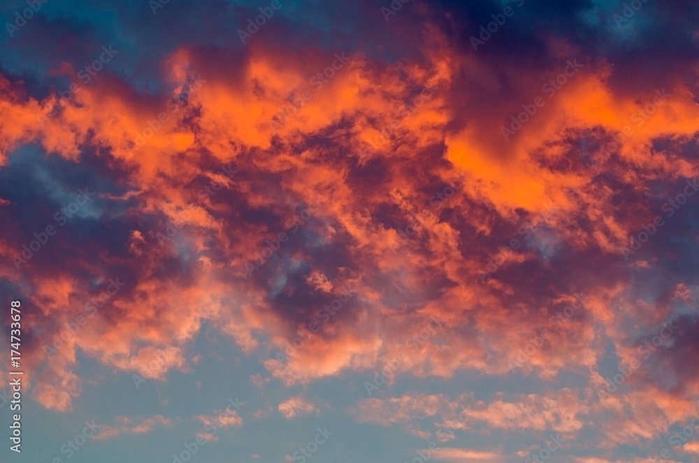 Beautiful sunset or sunrise with clouds, in pink and purple hues