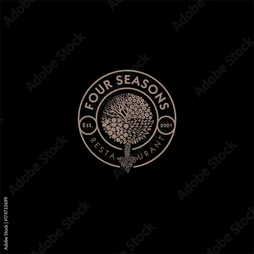 Four Seasons restaurant logo. Restaurant or hotel emblem. Wood as the seasons in a circle with the letters.