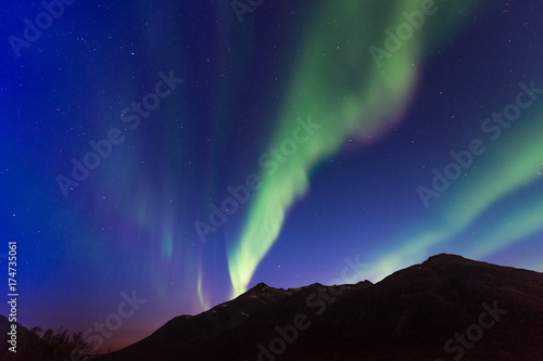 the polar lights over the city of Tromso © belov3097