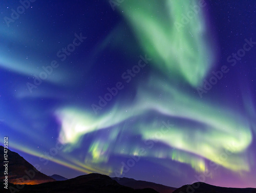 the polar lights over the city of Tromso