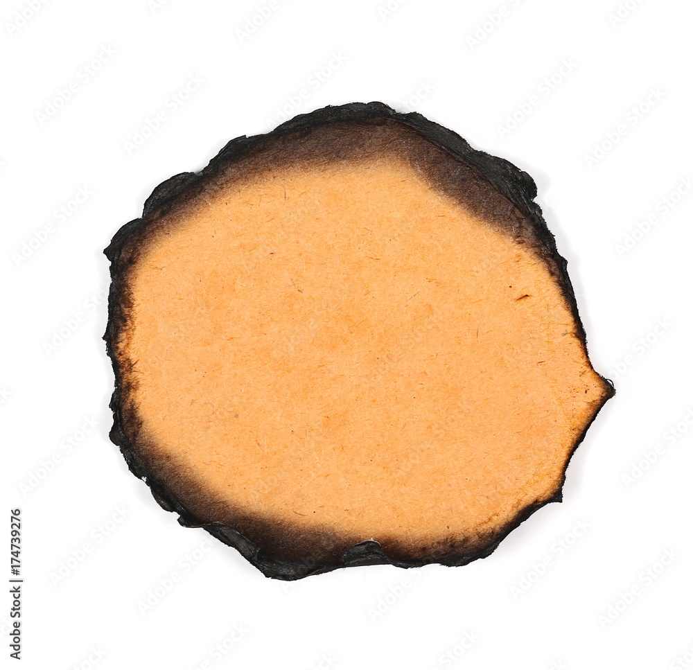 Old burning brown cardboard isolated on white background