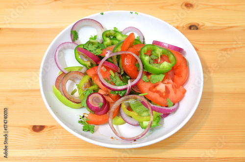Vegetable salad on plate.