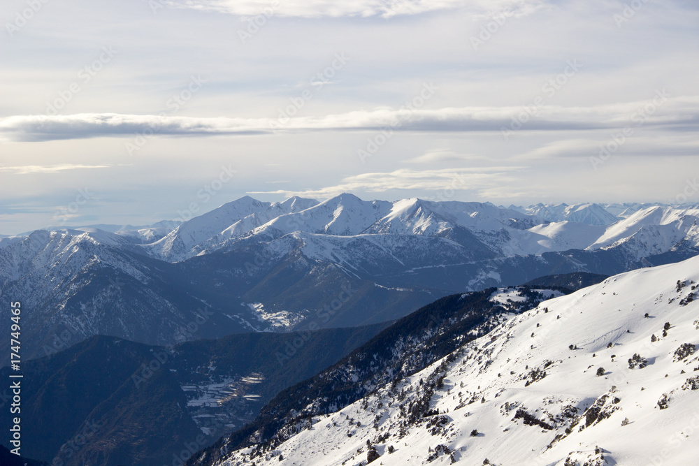 View to the snowy mountains called Wetterstein with a dramatic clouded