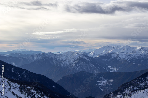 View to the snowy mountains called Wetterstein with a dramatic clouded © vfhnb12