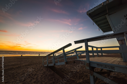 Lifeguard hut in Santa Monica beach at sunset