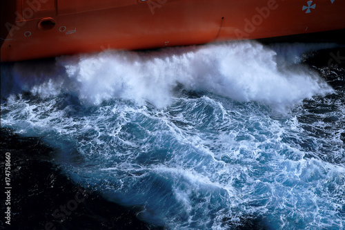 Fototapeta Naklejka Na Ścianę i Meble -  Sea water hitting the ship