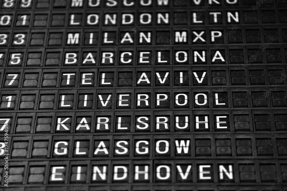 Departures board at the airport. Flight information mechanical timetable. Split flap mechanical departures board. Flight schedule Departures board at the airport. Flight information mechanical timetable. Split flap mechanical departures board. Flight schedule