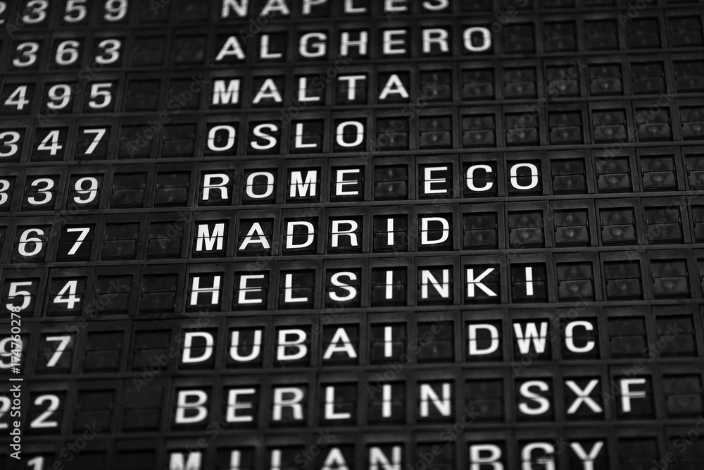 Departures board at the airport. Flight information mechanical timetable. Split flap mechanical departures board. Flight schedule Departures board at the airport. Flight information mechanical timetable. Split flap mechanical departures board. Flight schedule