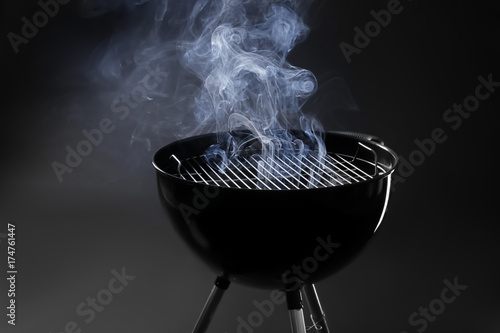 Barbecue grill on dark background
