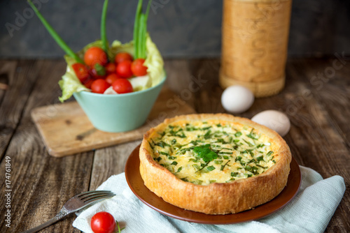 cheese cake on wooden texture with red cherry tomatoes